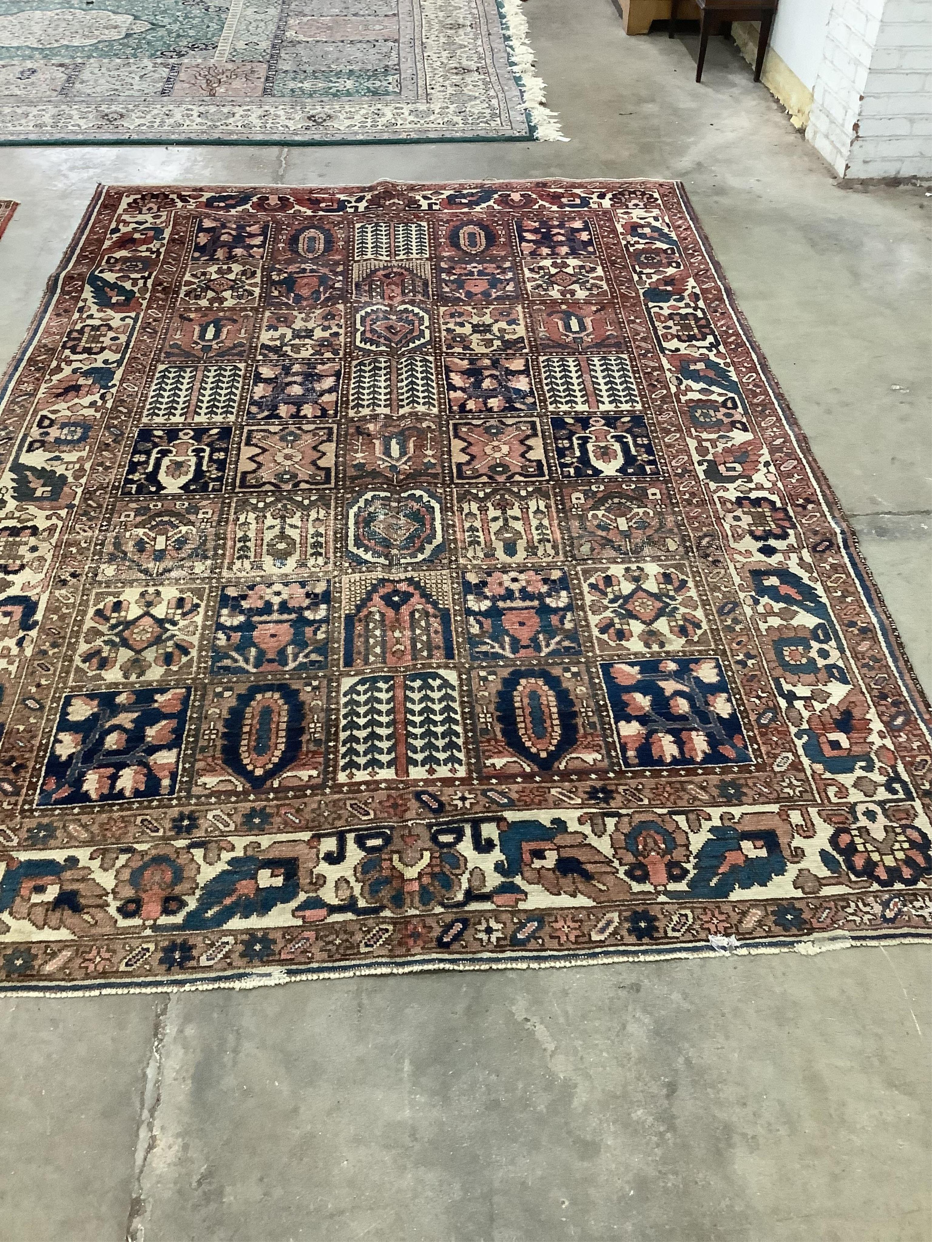 A Baktiari carpet, 320 x 215cm. Condition - poor to fair, worn in several places